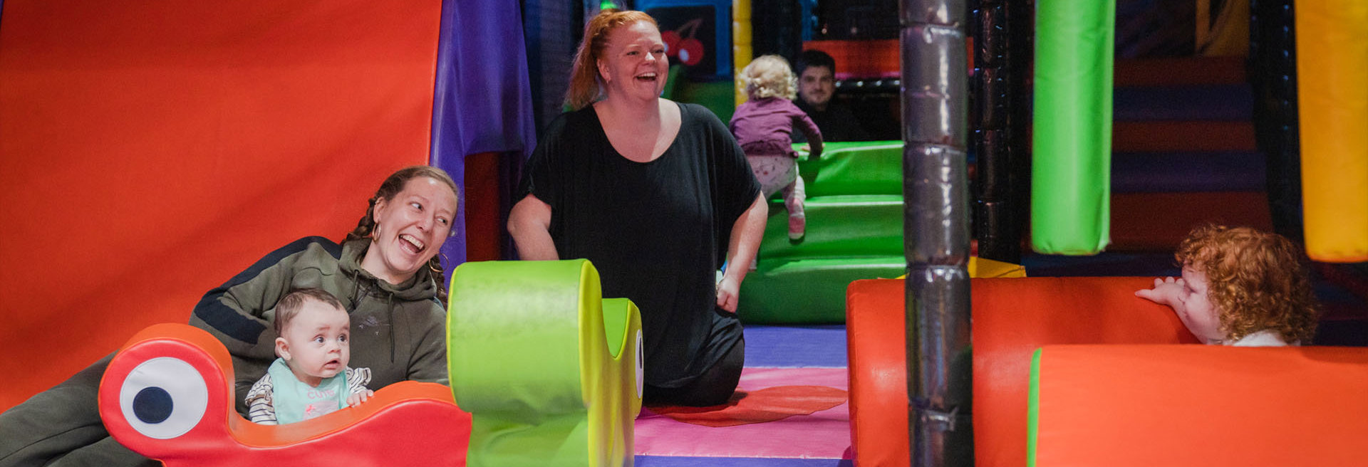 Parents and toddlers playing in soft play at namco funscape