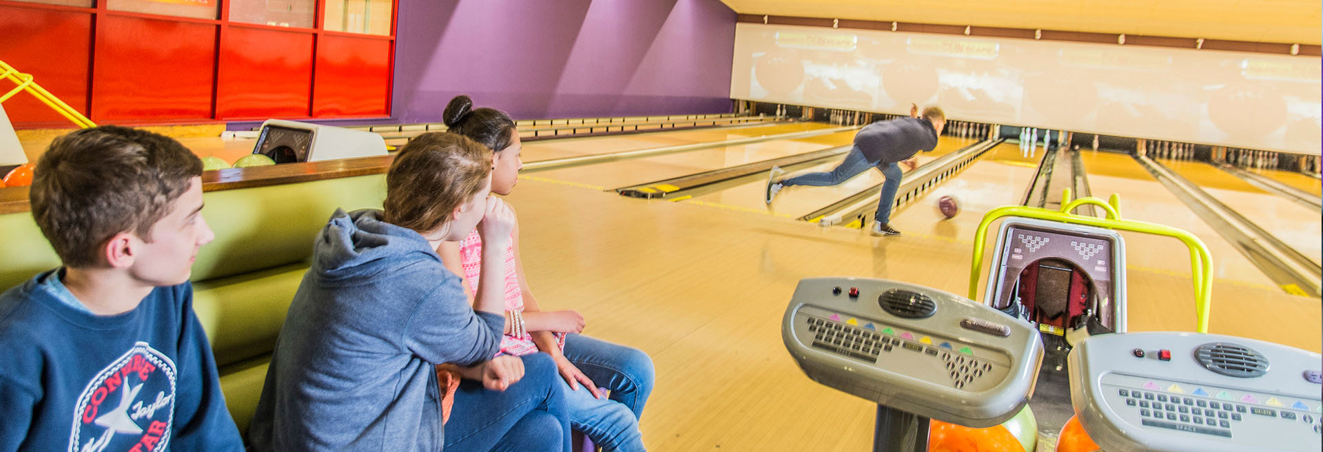 group of children having fun watching a friend bowl at namco funscape tamworth