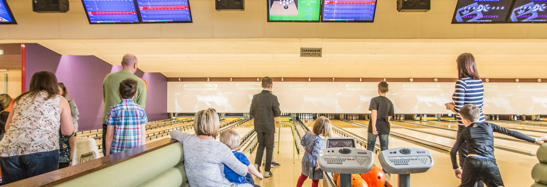 large group of family and friends enjoying a relaxing afternoon of bowling at namco funscape tamworth